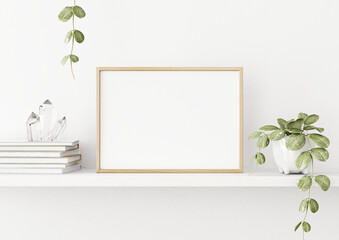 Aufkleber - Interior poster mockup with horizontal wooden frame on the shelf with green plant in pot, books, crystals and trendy decoration on empty white wall background. A4, A3 size. 3D rendering, illustration.