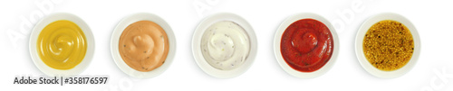 Fotografía Collection of various sauces in white ceramic bowl top view