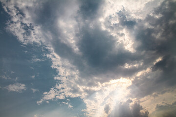 Wall Mural - picturesque clouds in the sky. window view of an airplane on a sunny gloomy day. stock photo backgro