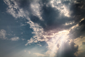Wall Mural - picturesque clouds in the sky. window view of an airplane on a sunny gloomy day. stock photo backgro