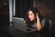 © Have a nice day  - Asian businesswoman working late night tired sleepy overworked using computer laptop technology freelance business plan strategy work from home desk modern office during coronavirus COVID-19 pandemic