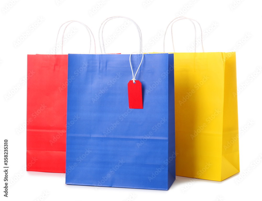 Paper shopping bags on white background