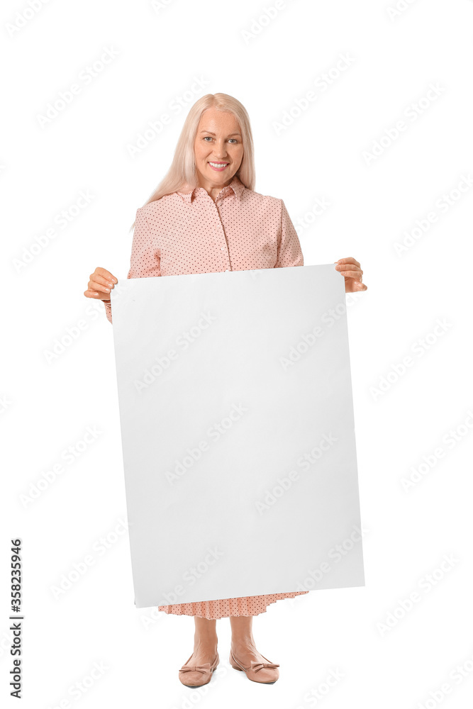 Mature woman with blank poster on white background