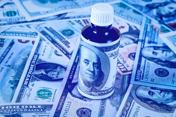 Wall Mural - Bottle of drug or vitamin with dollars.