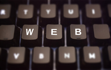 Poster - world wide web concept. web text written on keypad. black keys with white letters message of interne