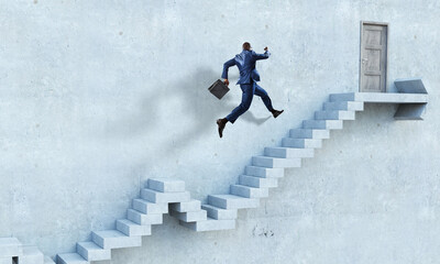 Image of businessman walking upstairs