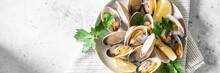 Cooked Clams In A Ceramic Plate On A Light Gray Table. Seafood Dish. Banner	