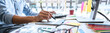 Leinwandbild Motiv Image of male creative graphic designer working on color selection and drawing on graphics tablet at workplace with work tools and accessories in workspace