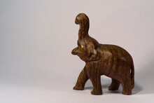 
Side View Of A Wooden Carved Elephant Statuette