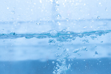 Water droplets moving in waves