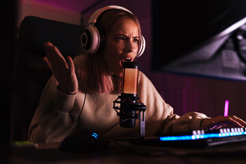 Poster - Image of displeased girl expressing irritation while playing video game