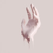 © vpanteon - Dripping beige color paint on hand, cosmetic cream banner creative concept idea. 3d rendering