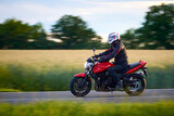 Unidentified man driving a motorcycle