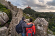 © romylee - father and son tourists looking at Pena castle