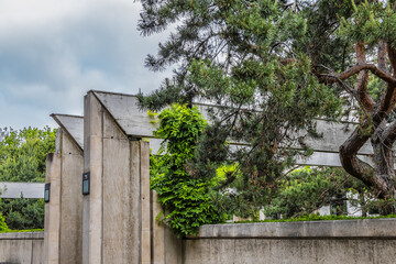 Garden Eugenie-Djendi (former Black Garden) - 2 hectares public parc between St. Charles Street (rue Saint-Charles) and Leblanc street (rue Leblanc) with a bushy vegetation. Paris, France.