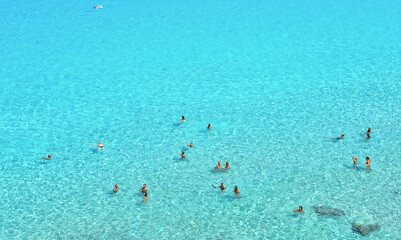 Wall Mural -  paradise clear turquoise blue water with rocks in Favignana island, Cala Azzura Beach, Sicily South Italy.