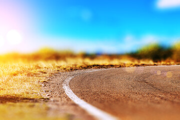 Wall Mural - abstract detail curve country road. empty asphalt rural road and blue sky nature landscape at sunset