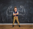 © shara - Portrait of smart kid boy with drawn muscles. Success, creative and innovation business concept