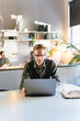 © sibstock - Young Man Freelancer Using Laptop Online Working From Office In Internet, Smiling Focused Millennial Guy Searching On Computer Surfing Web Looking At Screen Enjoying Distant Job