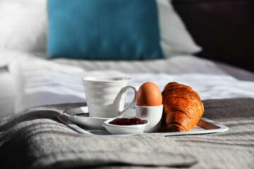 Wall Mural - Breakfast on tray in bed in hotel room