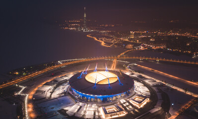 Wall Mural - Beautiful aerial view from the bird's eye view of the Gulf of Finland, Saint-Petersburg, Russia, with a stadium, western rapid diameter and cable-stayed bridge, view from quadrocopter drone flight