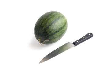 Watermelon with Knife on white background.