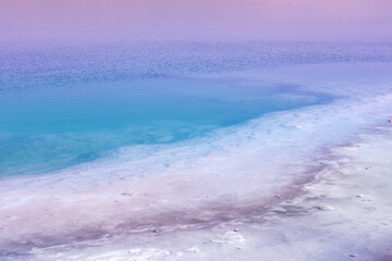 Fototapete - Dead sea in the early morning. Wild nature. Tropical minimalist landscape. Sunrise over the sea. Gradient color. Summertime.