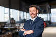 © Westend61 - Portrait of a confident mature businessman in a factory
