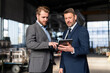 © Westend61 - Two businessmen with tablet having a meeting in a factory