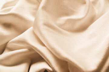 Silky organic cotton fabric with wavy texture.