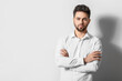 © Pixel-Shot - Handsome man with stylish hairdo on white background