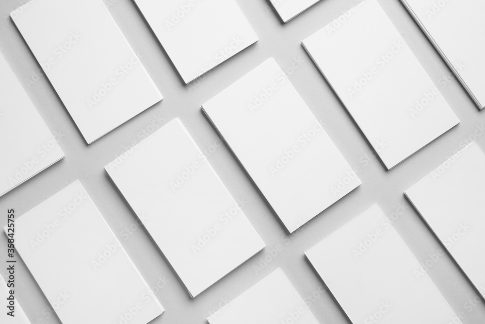 Blank business cards on light background