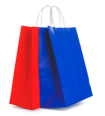 Paper shopping bags on white background