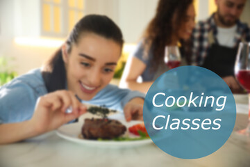 Wall Mural - Cooking classes. Blurred view of young woman serving food in kitchen