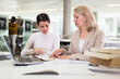 © JackF - Female teacher working with girl student in university library