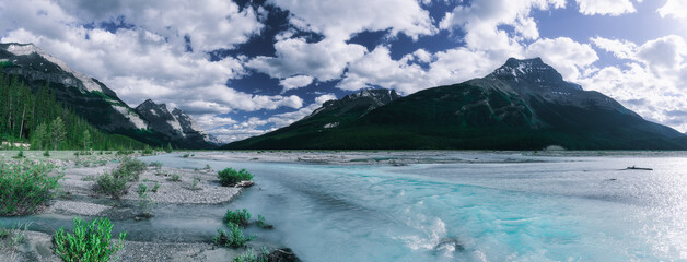 Wall Mural - dramatic landscape and glacial river along the icefields parkway, canada