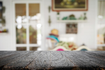 Empty wooden table space platform and blurred resturant or coffee shop background for product display montage.