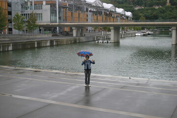 Rainy day activity - walking in the rain and enjoying visiting France