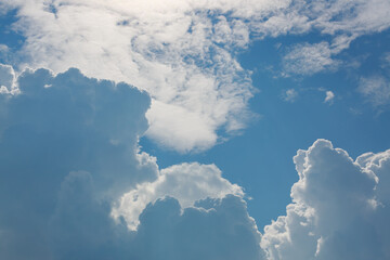 fluffy cloud above clear blue sky