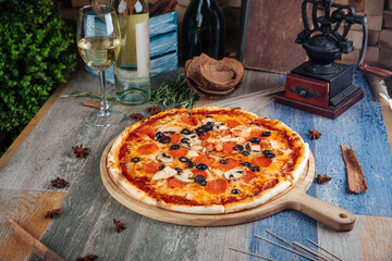 Wall Mural - Italian pizza capricciosa mushrooms olives salami