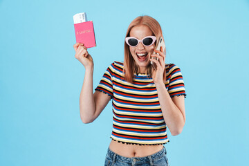 Sticker - Image of woman holding passport with tickets and talking on cellphone