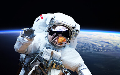 Wall Mural - astronaut in outer space. spacewalk. elements of this image furnished by nasa