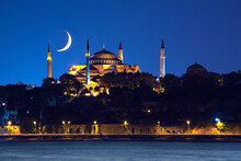 Hagia Sophia At Night With Crescent Moon In The Sky, Istanbul, Turkey