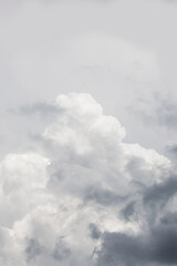 Wall Mural - Dramatic gray clouds in the pale gray sky. Beautiful gray and white cloudy sky