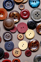 Poster - Background and texture of multicolored antique buttons