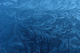 Fototapeta Łazienka - beautiful ice flower shapes and patterns on frost frozen window