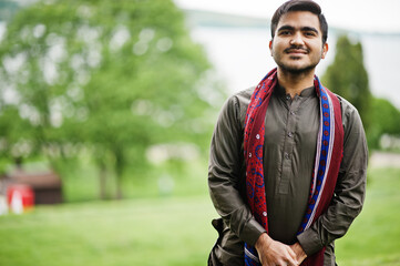 Indo pakistani man wear traditional clothes achkan or sherwani.