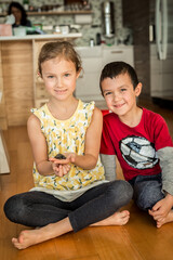 Brother and Sister Holding Box Turtle