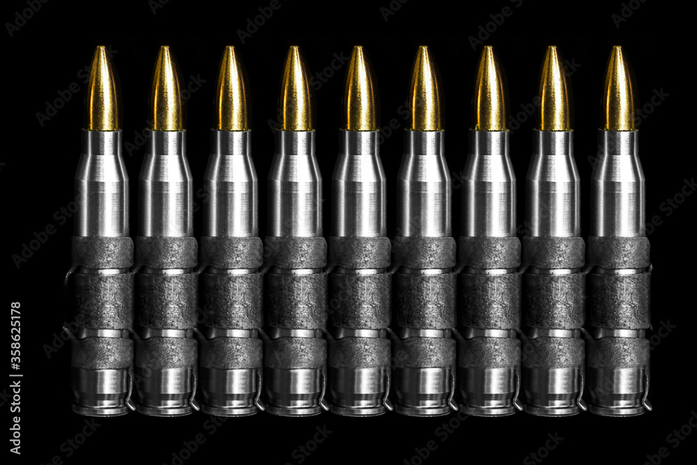Bullet 5.56 mm chain ammunition isolated on black background Stock ...