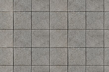 Coating With Modern Textured Paving Tiles Of Square Shape.